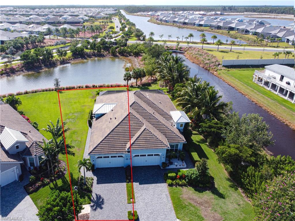 5974 Haiti Drive Naples, FL 34113 - Photo 1 of 1 an aerial view of a house with a outdoor space