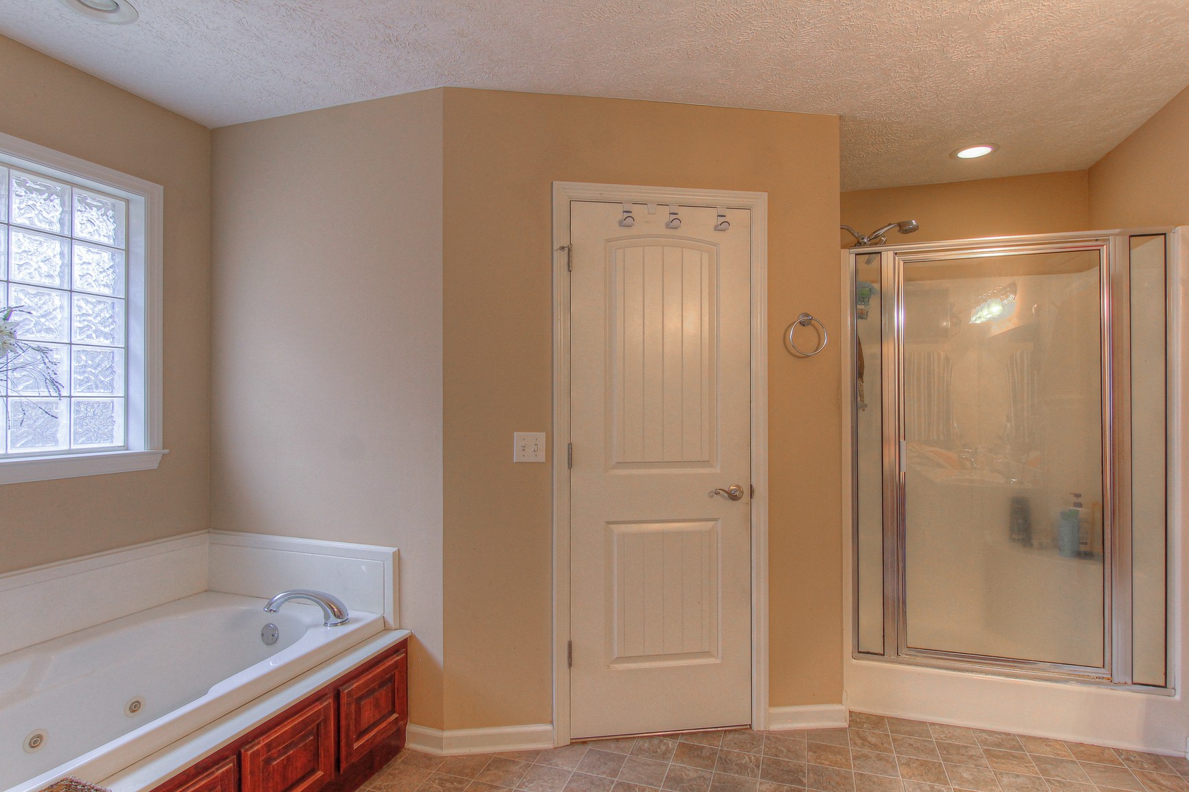 228 Espy Road Manchester, TN 37355 - Photo 15 of 46 a bathroom with a tub and shower