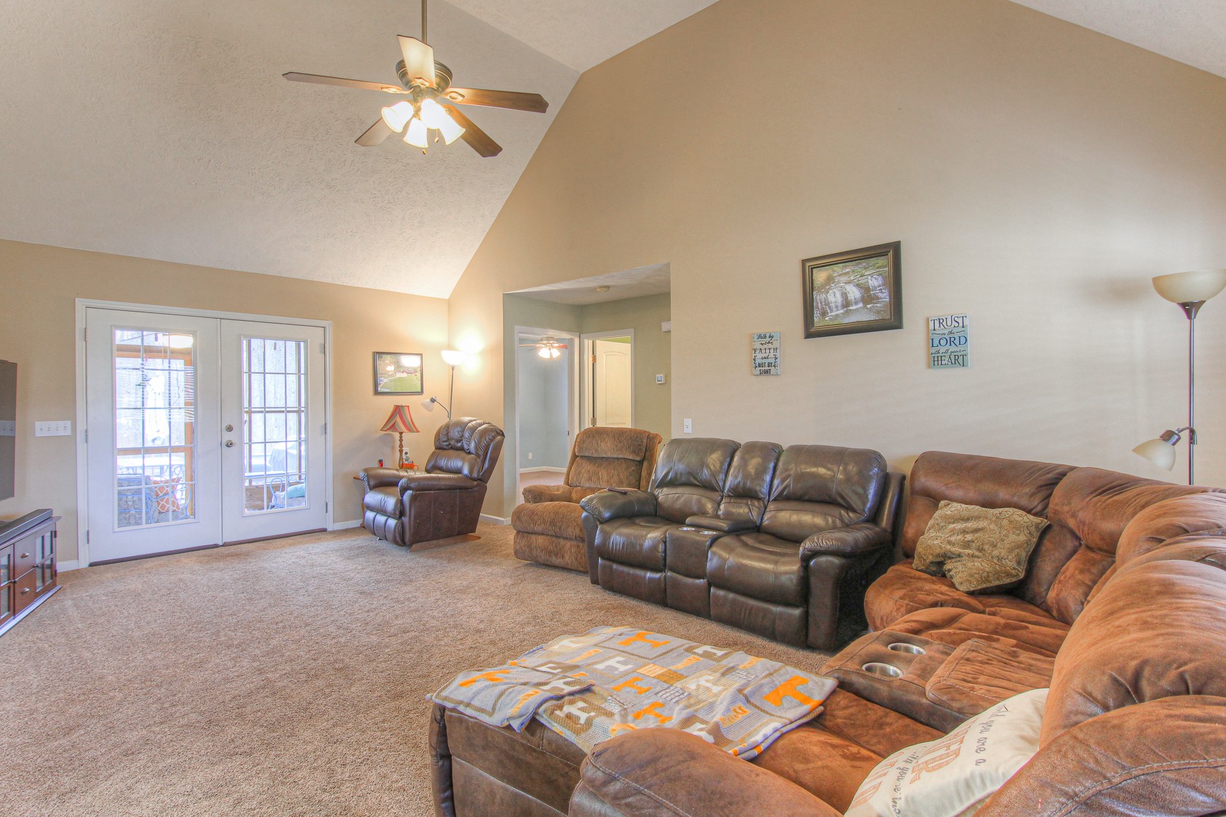 228 Espy Road Manchester, TN 37355 - Photo 7 of 46 a living room with furniture a couch and chandelier fan