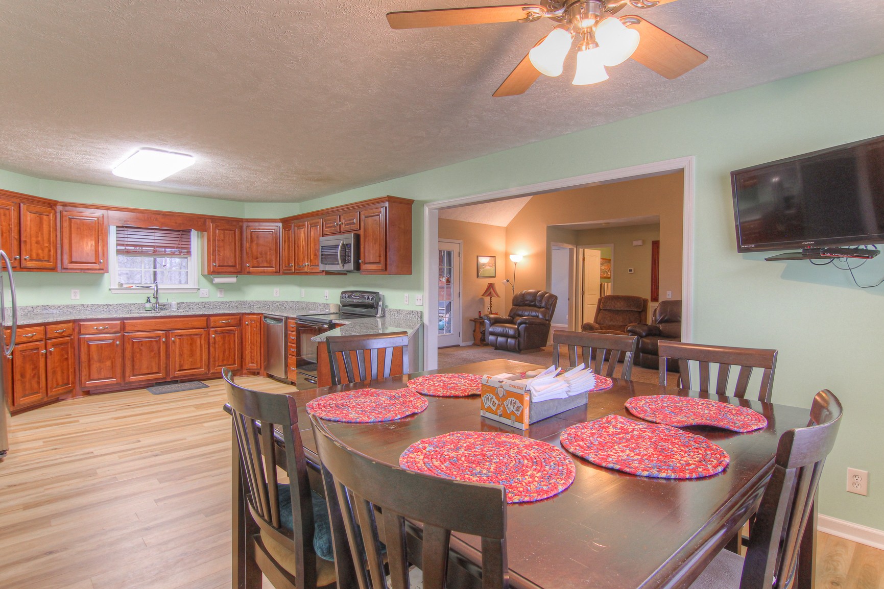 228 Espy Road Manchester, TN 37355 - Photo 10 of 46 a view of a dining room with furniture and a kitchen view