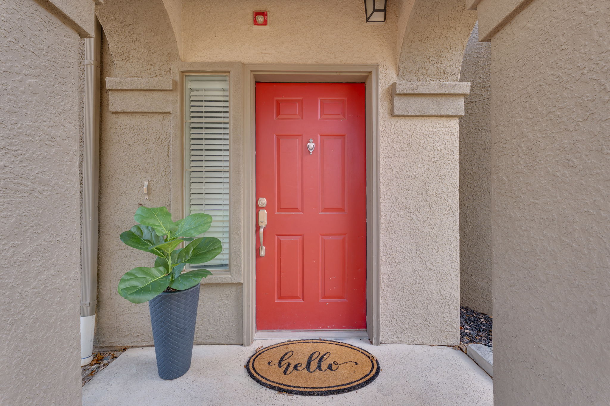 11203 Ranch Road 2222, Unit 901 Austin, TX 78732 - Photo 2 of 40 Property entrance featuring stucco siding