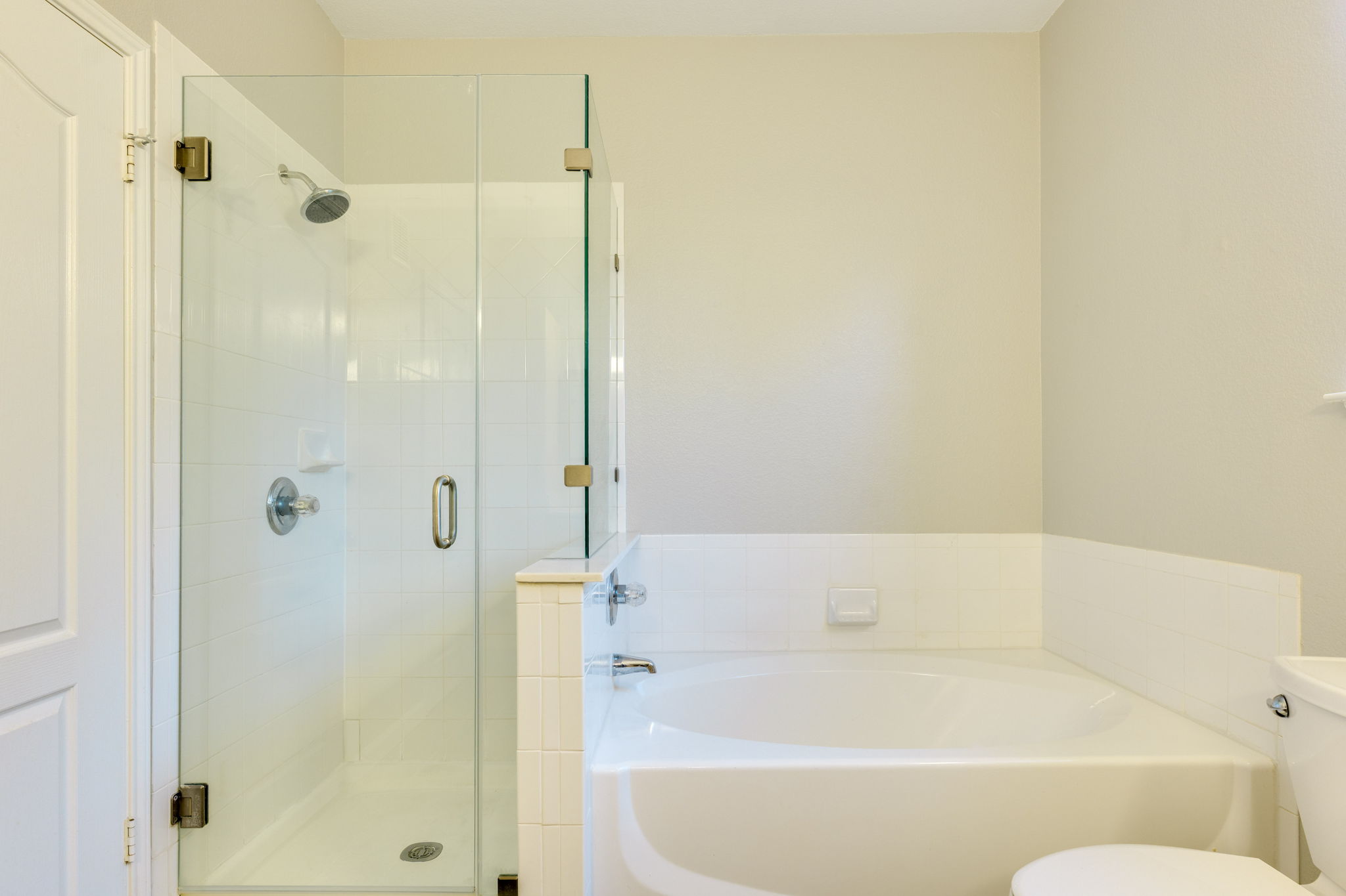 11203 Ranch Road 2222, Unit 901 Austin, TX 78732 - Photo 23 of 40 Full bath with a bath and a shower stall