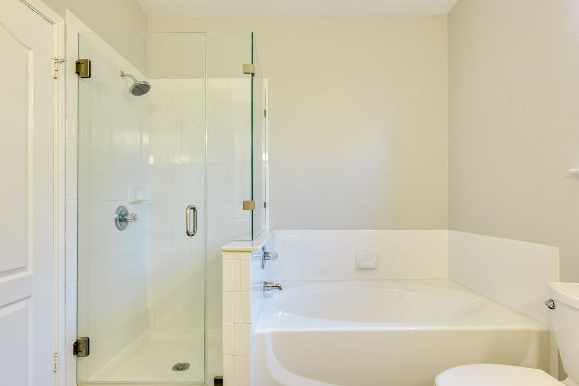 11203 Ranch Road 2222, Unit 901 Austin, TX 78730 - Photo 23 of 40 Full bath with a bath and a shower stall