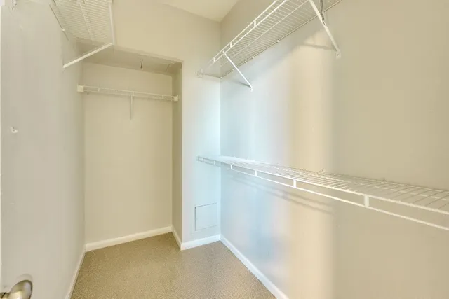 a view of a room with racks on the wall
