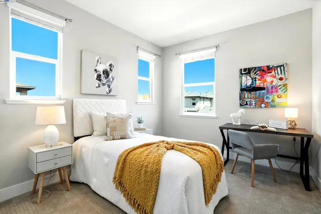 a view of a workspace area with furniture and wooden floor