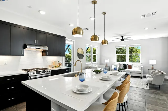 a very nice looking dining room with a table and chairs