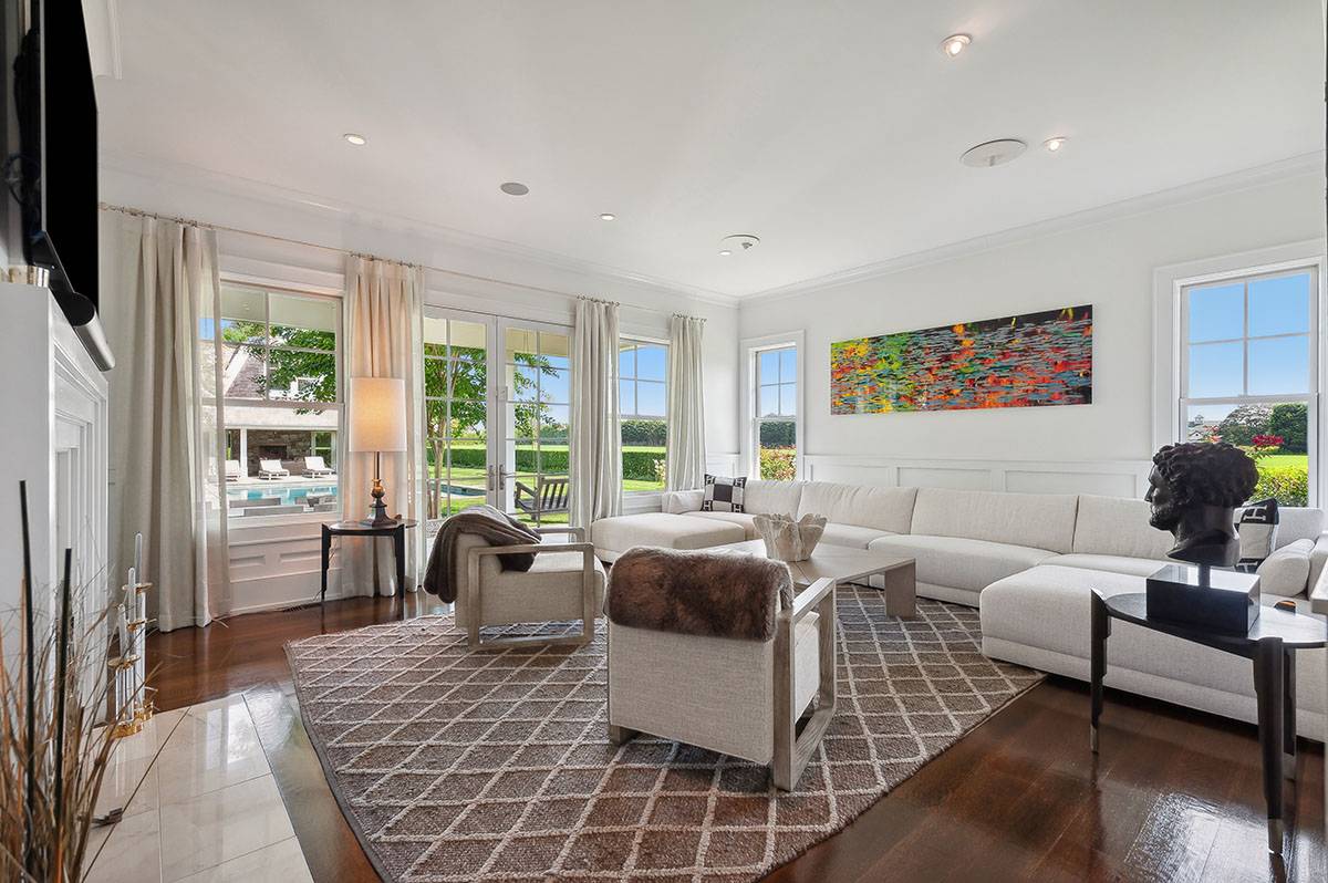 63 Newlight Lane Bridgehampton, NY 11976 - Photo 9 of 37 a living room with furniture and a flat screen tv