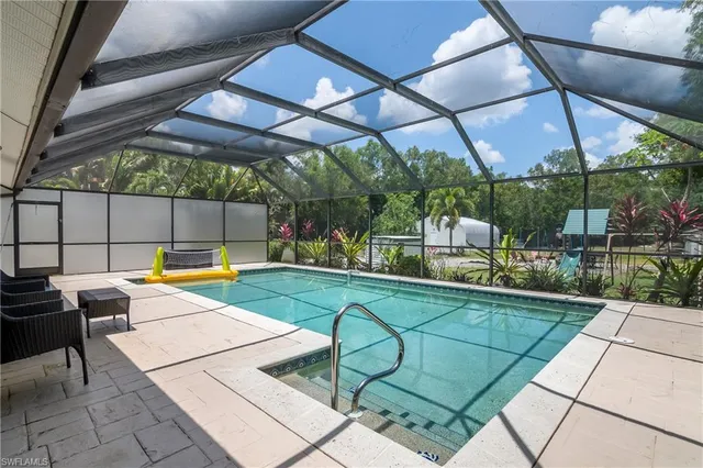 a view of outdoor space with swimming pool