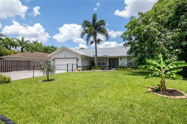 a house view with a garden space