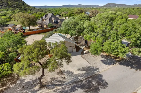 a view of a town with mountains in the background