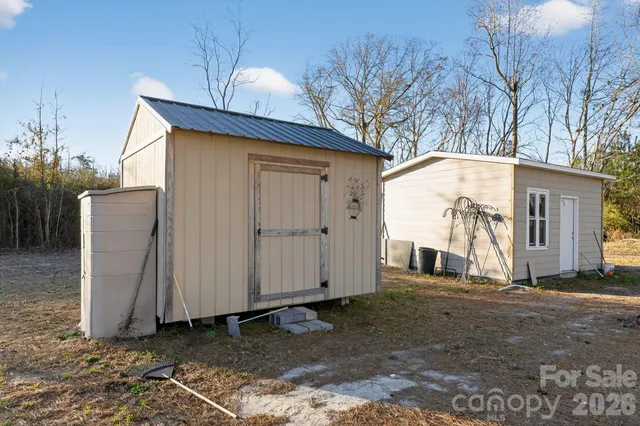 a living room with furniture fireplace and rug