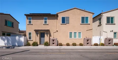 a view of a house with a street