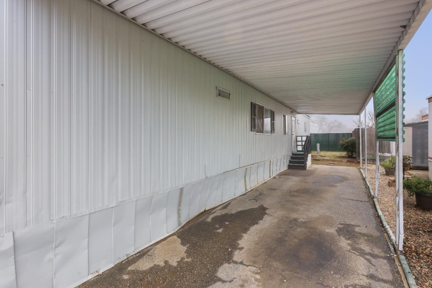 19142 North Jack Tone Road, Unit 34 Lockeford, CA 95237 - Photo 7 of 21 a view of a porch