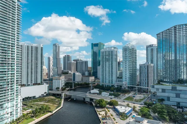 a view of house with outdoor space and swimming pool