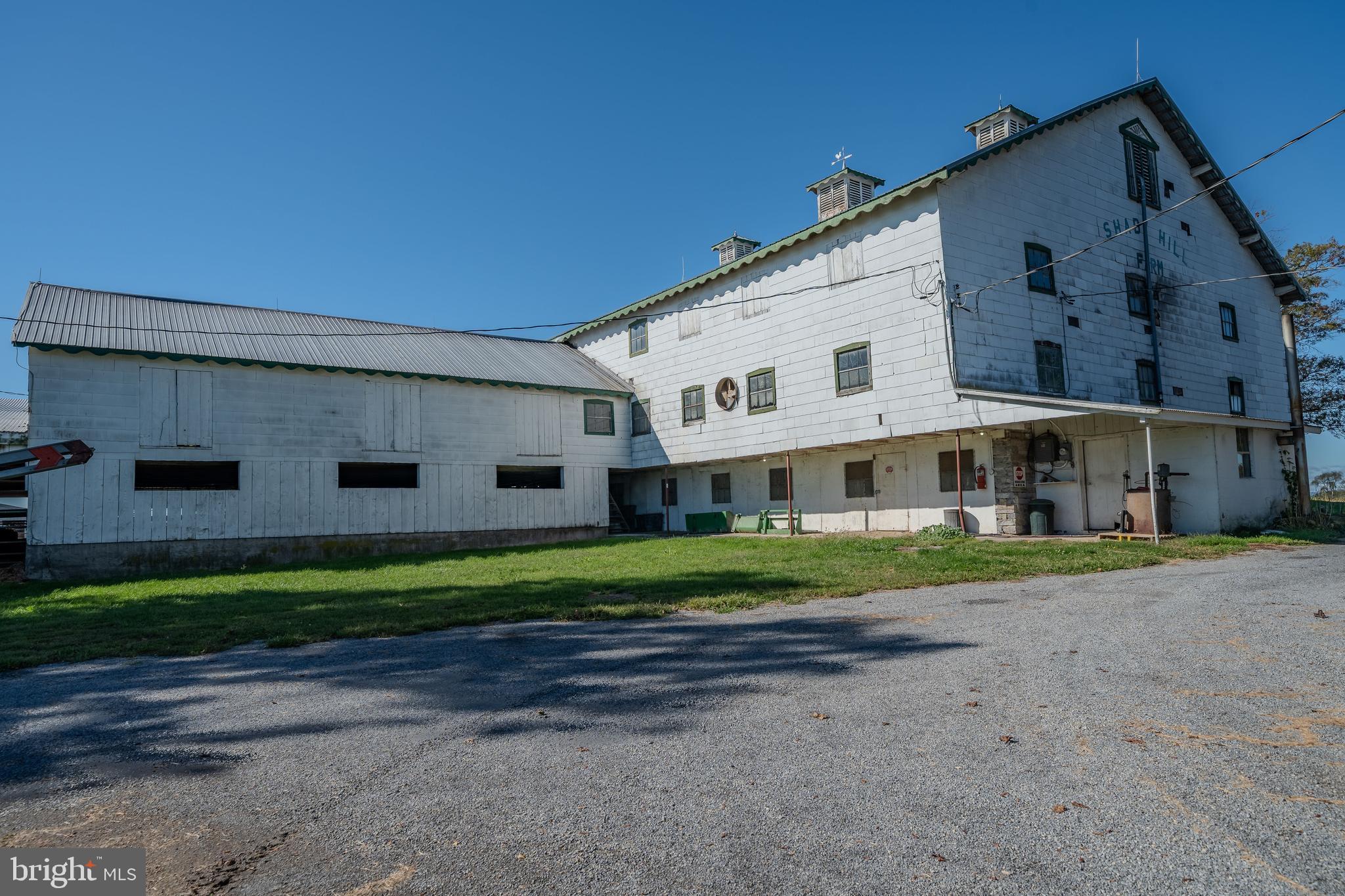 155 Shady Hill Road Milton, PA 17847 - Photo 22 of 70 a view of a big house with a big yard and potted plants