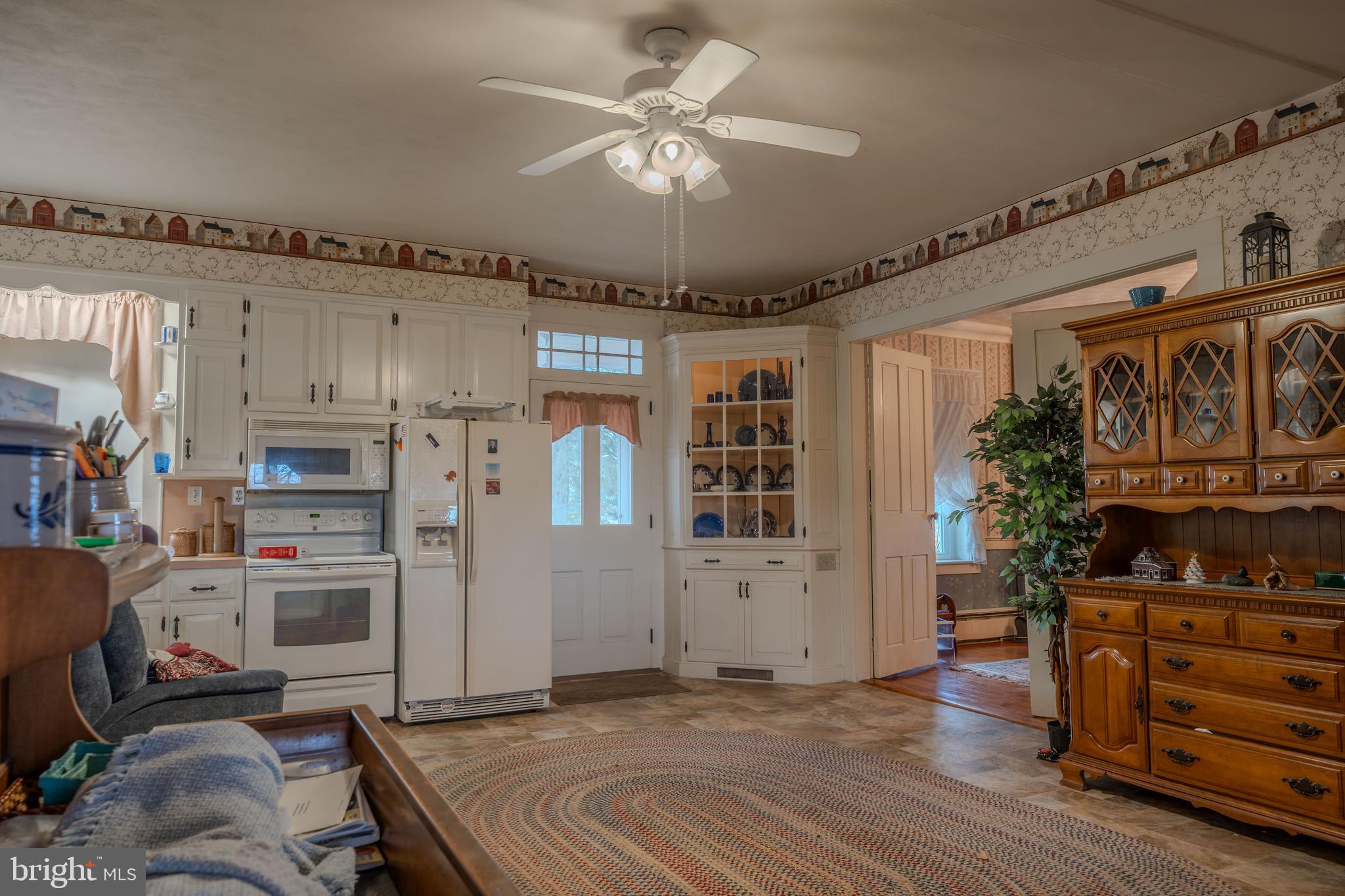 155 Shady Hill Road Milton, PA 17847 - Photo 47 of 70 a view of a kitchen with furniture and staircase