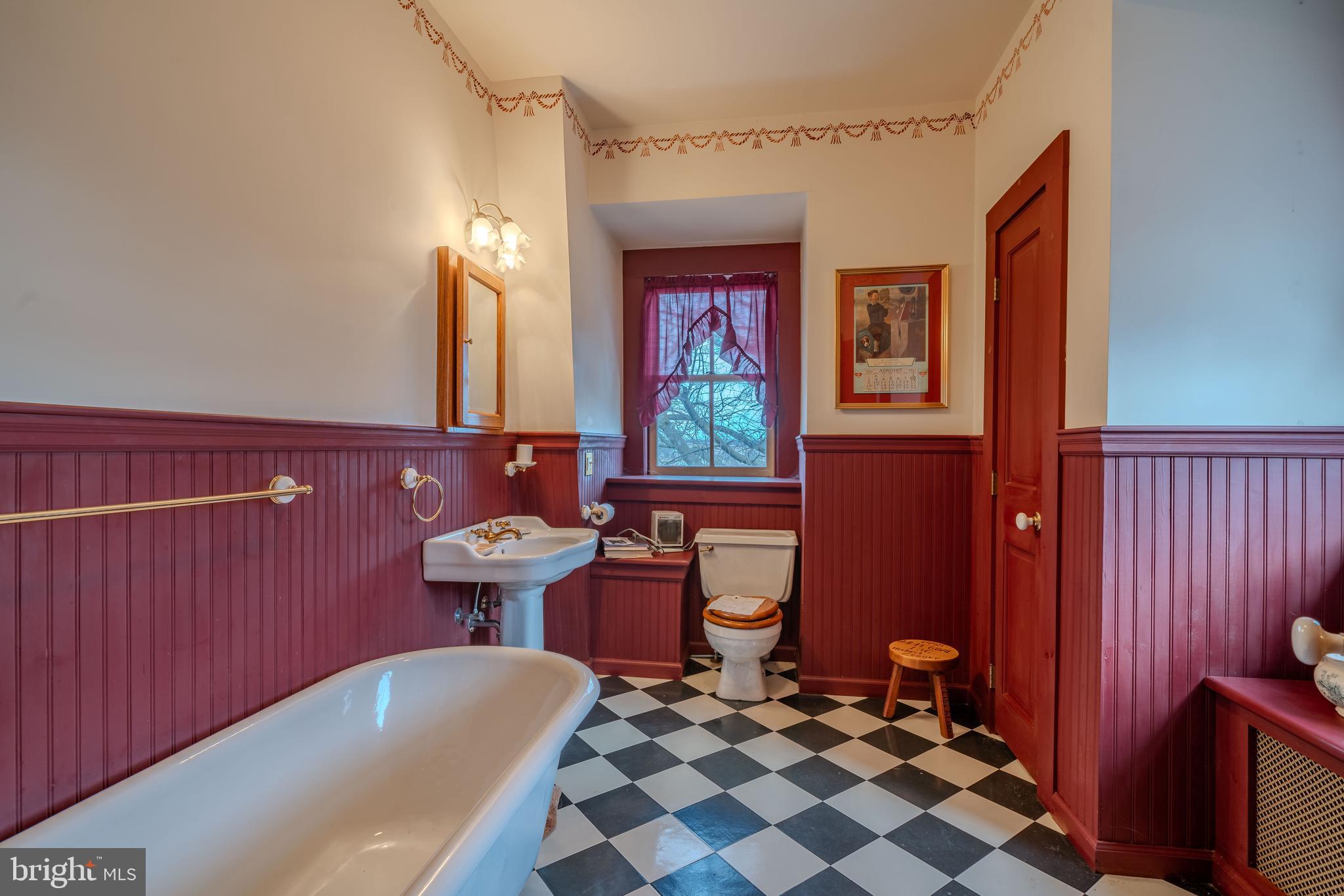 155 Shady Hill Road Milton, PA 17847 - Photo 68 of 70 a bathroom with a sink mirror and toilet