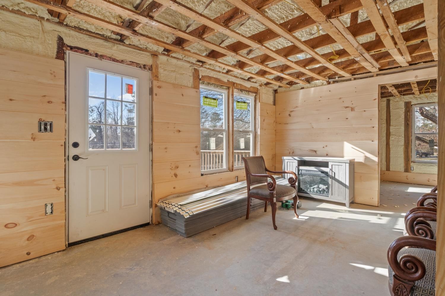 70 Old Bruceton Road Bruceton, TN 38317 - Photo 11 of 33 a view of a livingroom with furniture and a garage