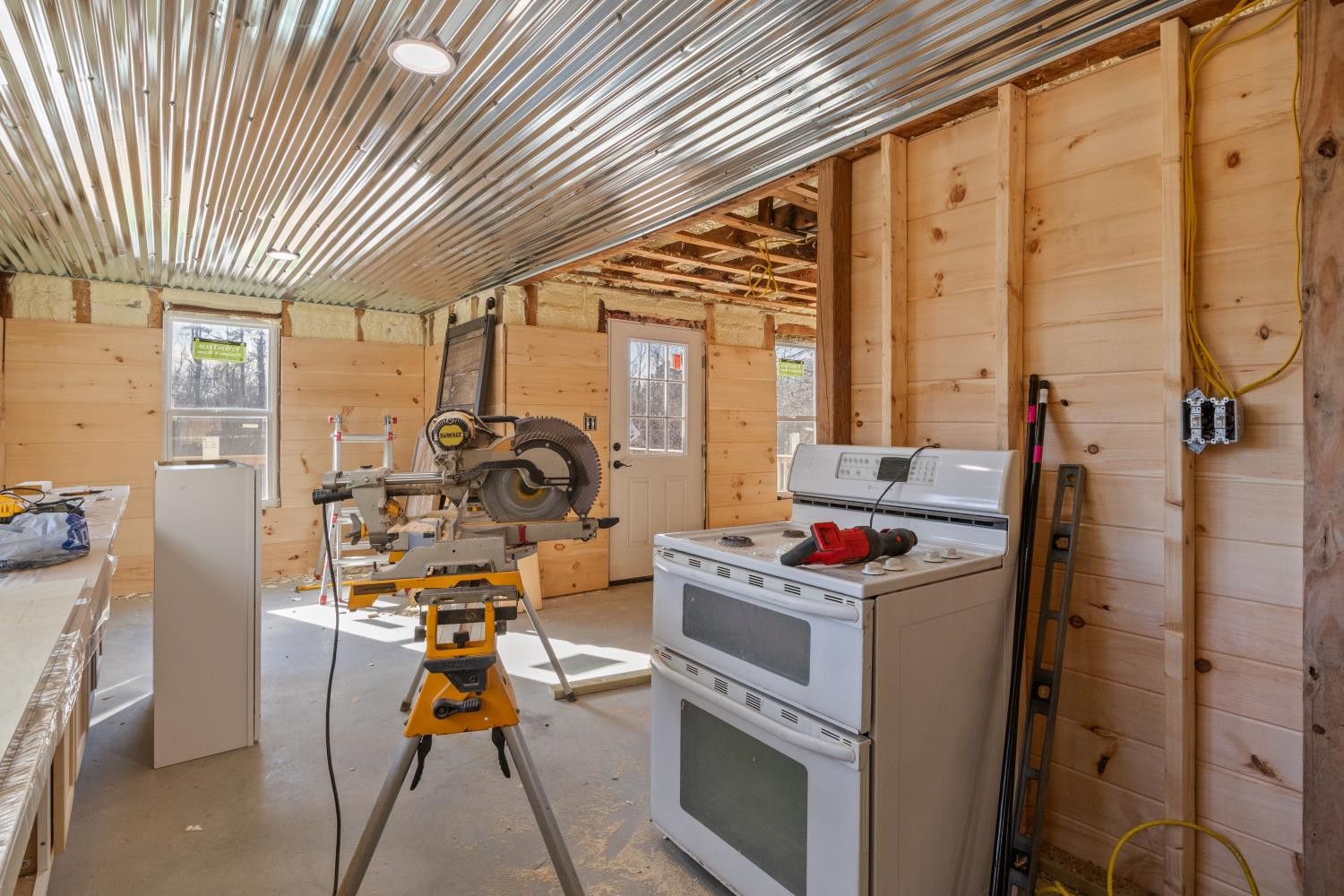 70 Old Bruceton Road Bruceton, TN 38317 - Photo 19 of 33 a storage room with washer and dryer