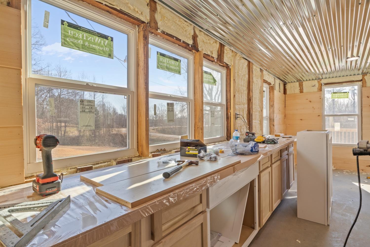 70 Old Bruceton Road Bruceton, TN 38317 - Photo 20 of 33 a kitchen with a sink and a large window