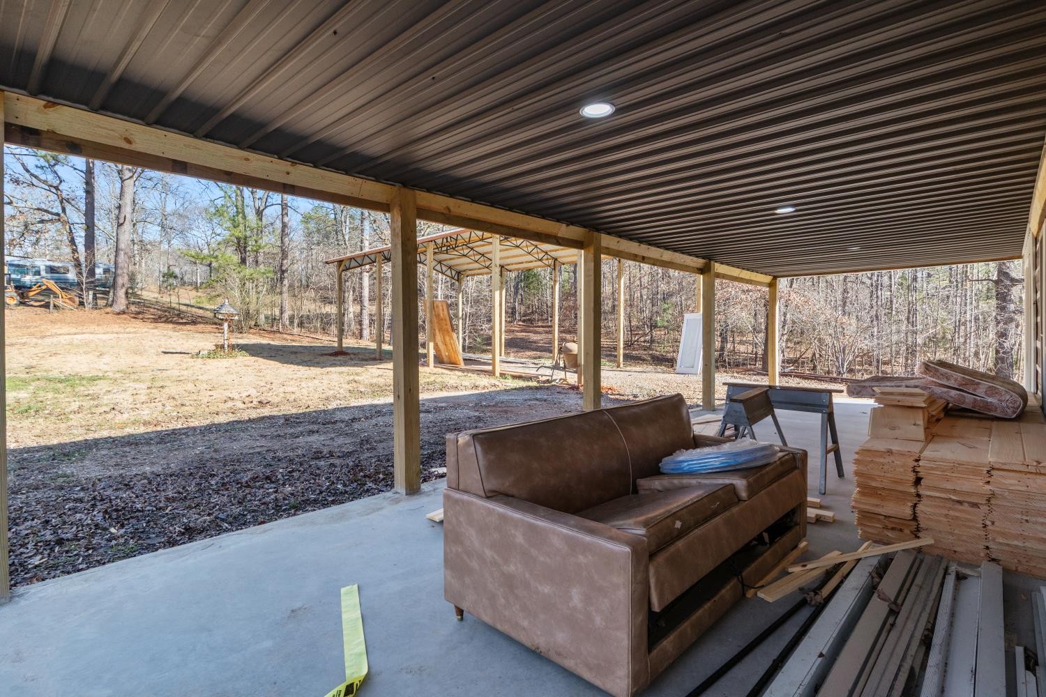 70 Old Bruceton Road Bruceton, TN 38317 - Photo 25 of 33 a outdoor living space with patio furniture