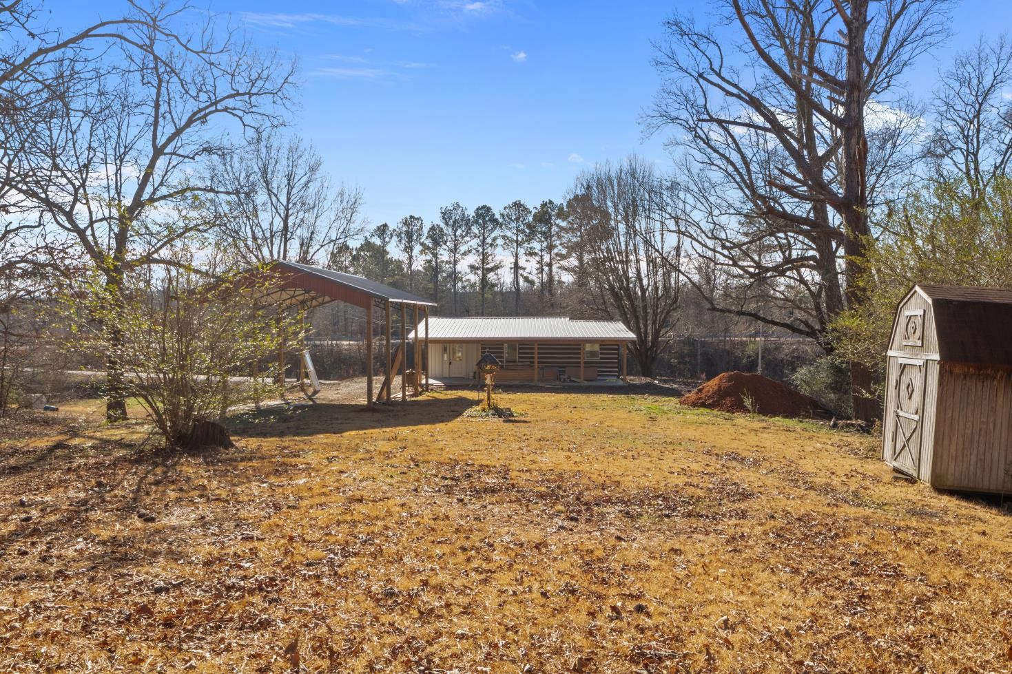 70 Old Bruceton Road Bruceton, TN 38317 - Photo 28 of 33 a view of a yard with snow in front of house