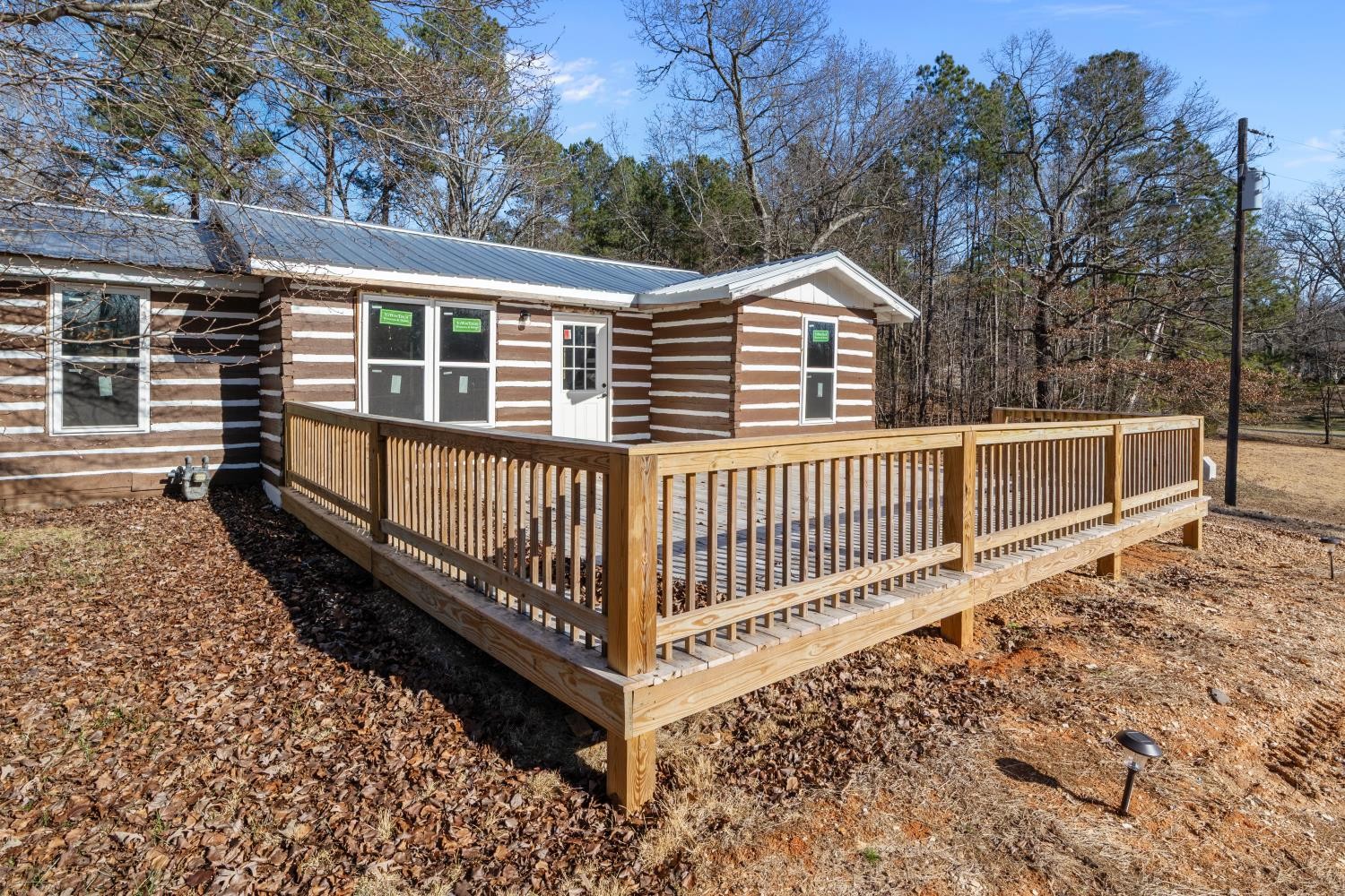 70 Old Bruceton Road Bruceton, TN 38317 - Photo 32 of 33 a view of a house with wooden fence