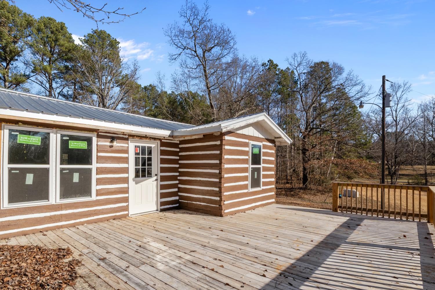 70 Old Bruceton Road Bruceton, TN 38317 - Photo 7 of 33 a view of a house with a backyard