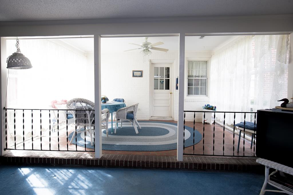 499 Pine Street Bamberg, SC 29003 - Photo 2 of 28 a view of a balcony with furniture and a window