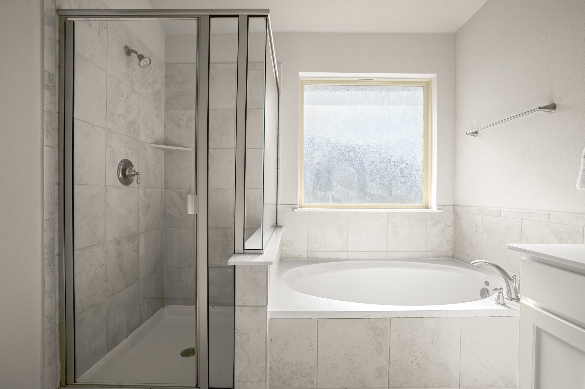2209 Hat Bender Loop Round Rock, TX 78664 - Photo 15 of 25 a white bath tub sitting next to a shower