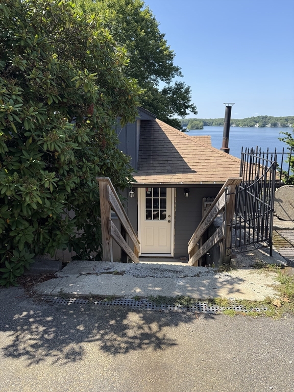 570 Eastside Road Wrentham, MA 02093 - Photo 2 of 31 a view of a house with a park