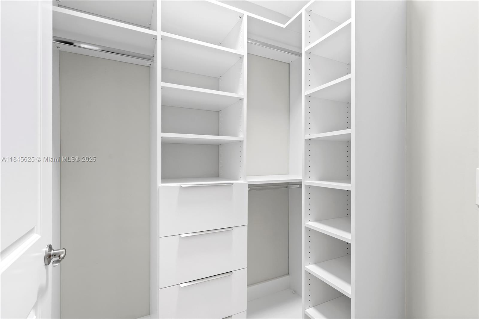 811 Southeast 12th Court Fort Lauderdale, FL 33316 - Photo 10 of 18 a view of walk in closet with empty racks