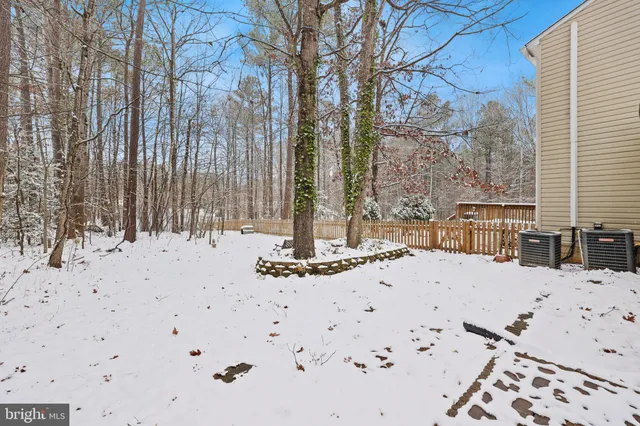 a view of a terrace with snow on the road