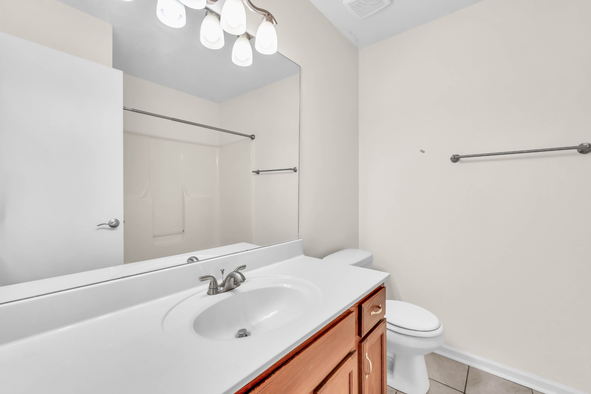 2451 Wilson Road, Unit 6 Clarksville, TN 37043 - Photo 13 of 21 a bathroom with a sink a toilet and a mirror