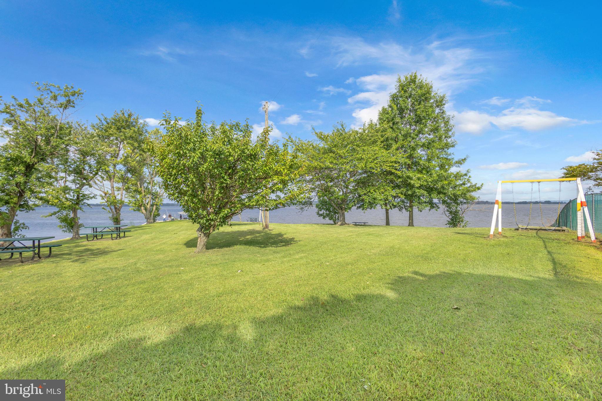 36031 Bay Drive Chaptico, MD 20621 - Photo 23 of 34 a view of a yard with a house