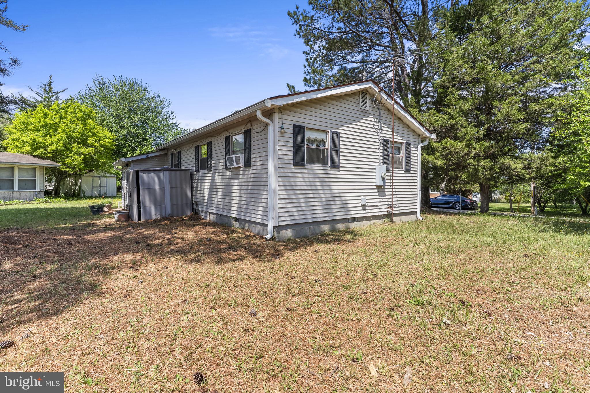 36031 Bay Drive Chaptico, MD 20621 - Photo 27 of 34 a view of a house with a yard