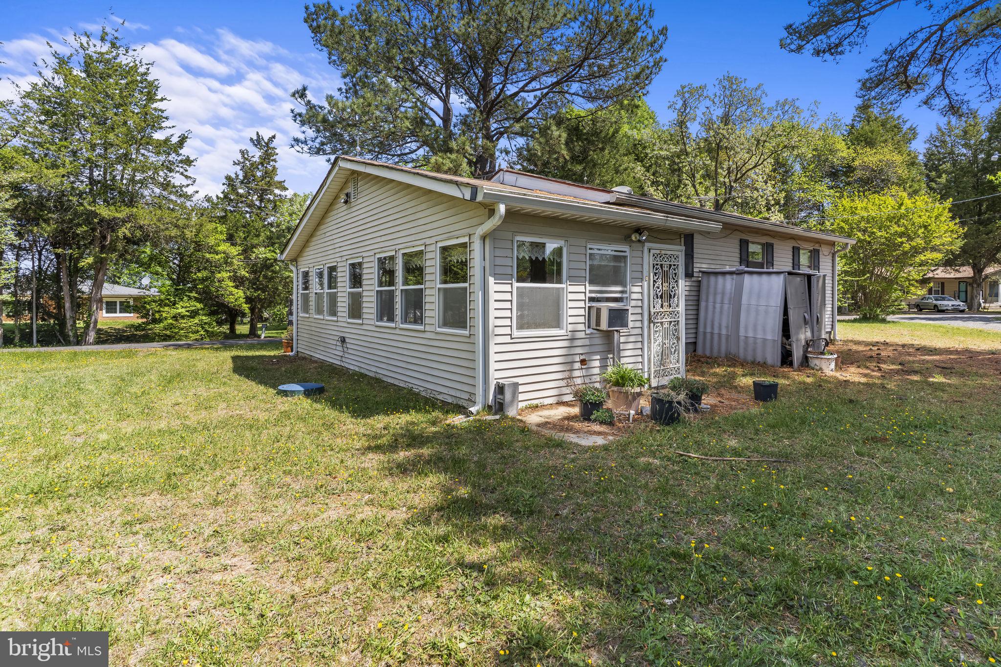36031 Bay Drive Chaptico, MD 20621 - Photo 31 of 34 a view of a house with a yard