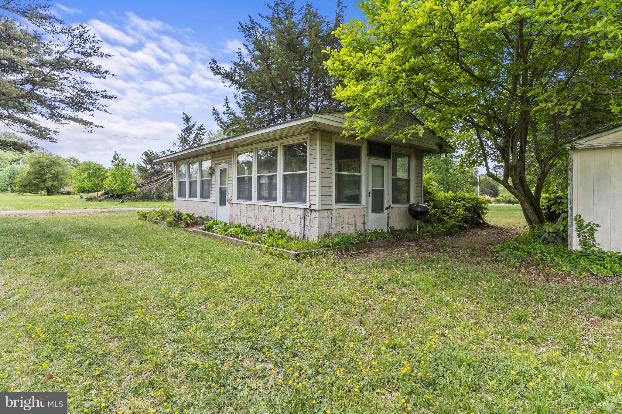 36031 Bay Drive Chaptico, MD 20621 - Photo 32 of 34 front view of a house with a yard