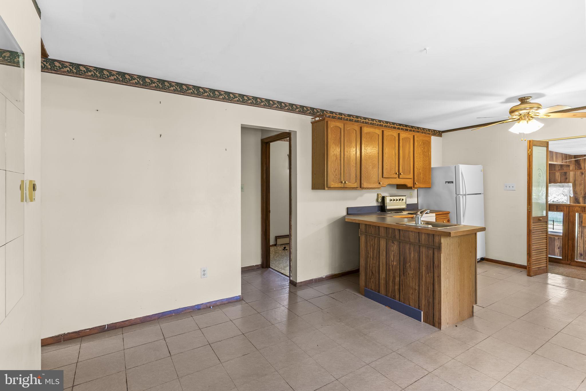36031 Bay Drive Chaptico, MD 20621 - Photo 6 of 34 a view of a kitchen with a sink