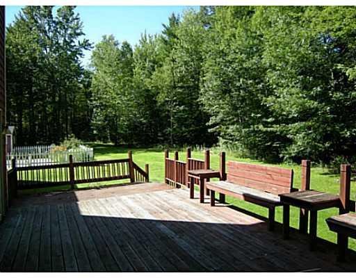 79 Orchard Road Cumberland, ME 04021 - Photo 22 of 22 Patio/Deck. View of back yard and...