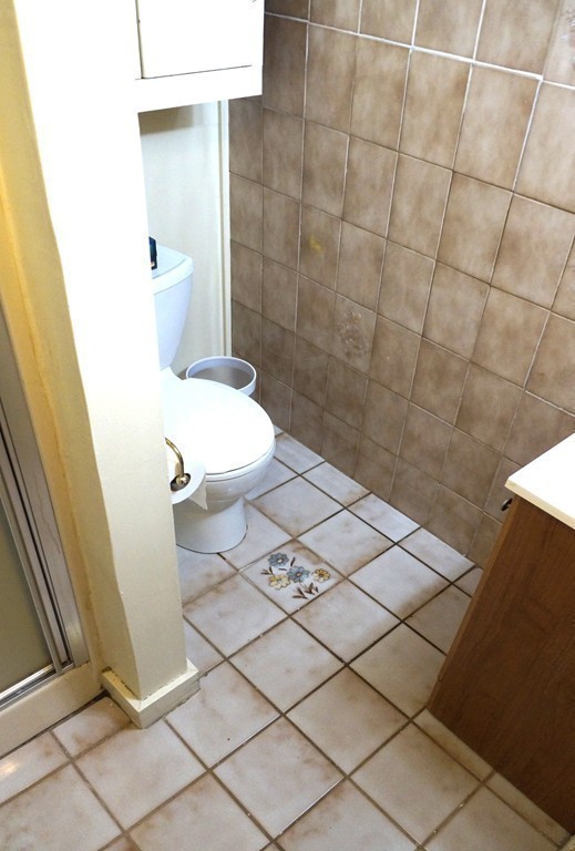 7 Pryor Road Natick, MA 01760 - Photo 21 of 24 a bathroom with a toilet and a shower