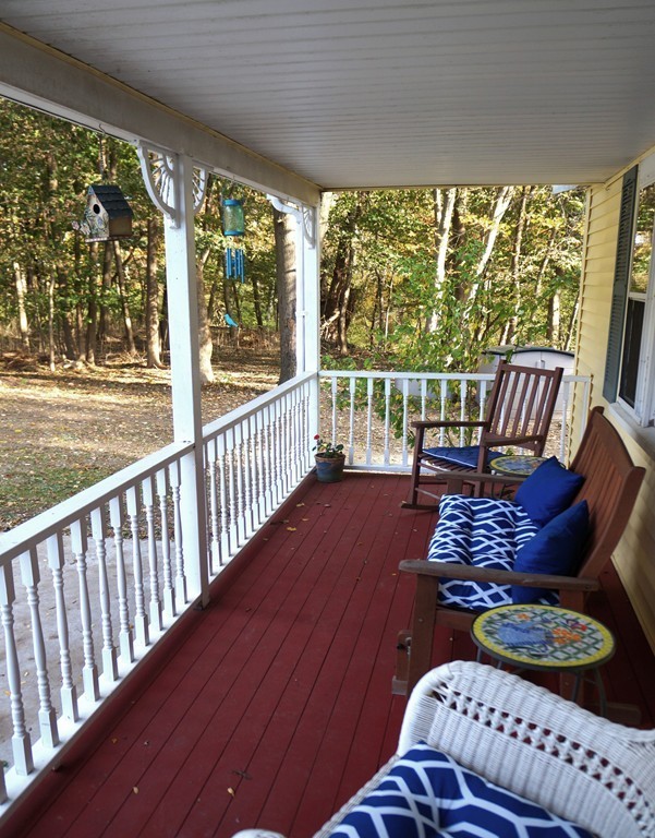 7 Pryor Road Natick, MA 01760 - Photo 3 of 24 a living room with furniture and a floor to ceiling window