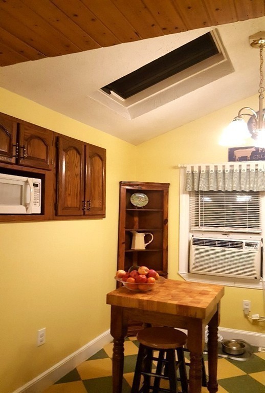 7 Pryor Road Natick, MA 01760 - Photo 4 of 24 a workspace with furniture and window