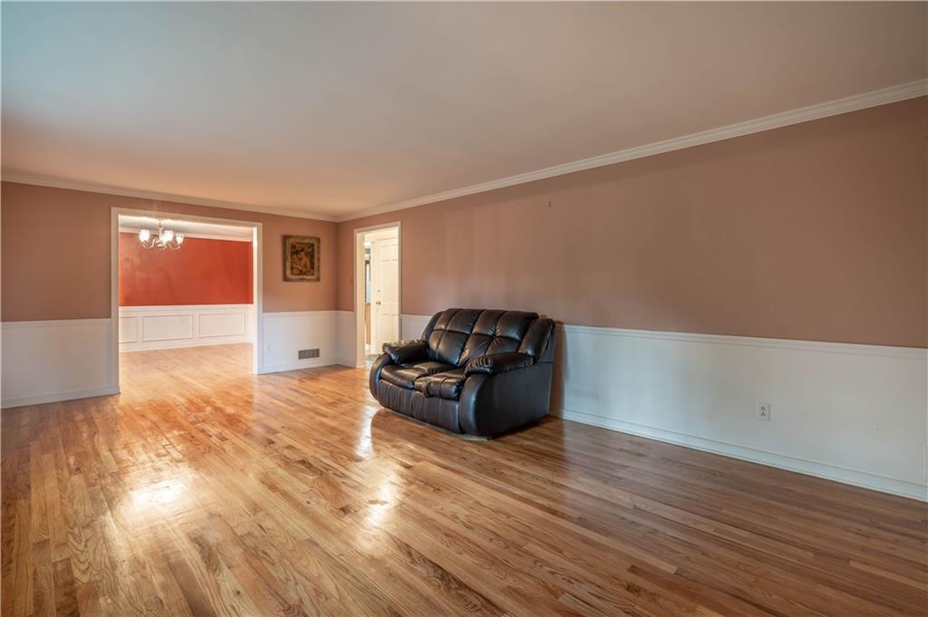 3326 Ponoka Road Pittsburgh, PA 15241 - Photo 8 of 25 a living room with furniture and wooden floor