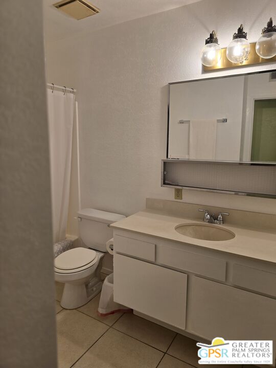 365 West Mariscal Road Palm Springs, CA 92262 - Photo 15 of 25 a bathroom with a sink a toilet and mirror