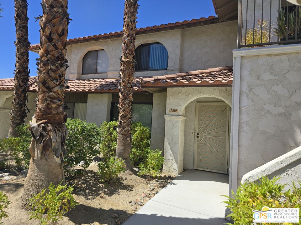 365 West Mariscal Road Palm Springs, CA 92262 - Photo 23 of 25 a front view of a house with garden