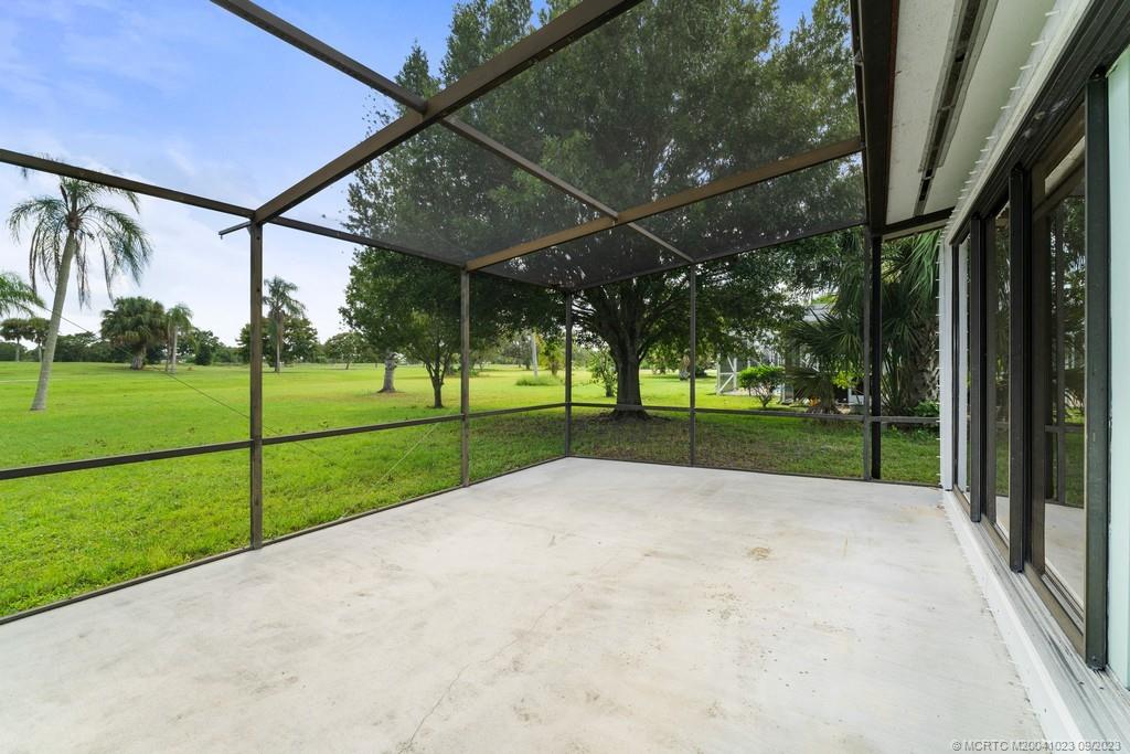 2825 Southeast Pocatella Road Port St. Lucie, FL 34952 - Photo 19 of 36 a view of a park with swings and slides