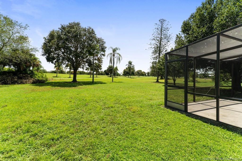 2825 Southeast Pocatella Road Port St. Lucie, FL 34952 - Photo 22 of 36 a view of a park with large trees