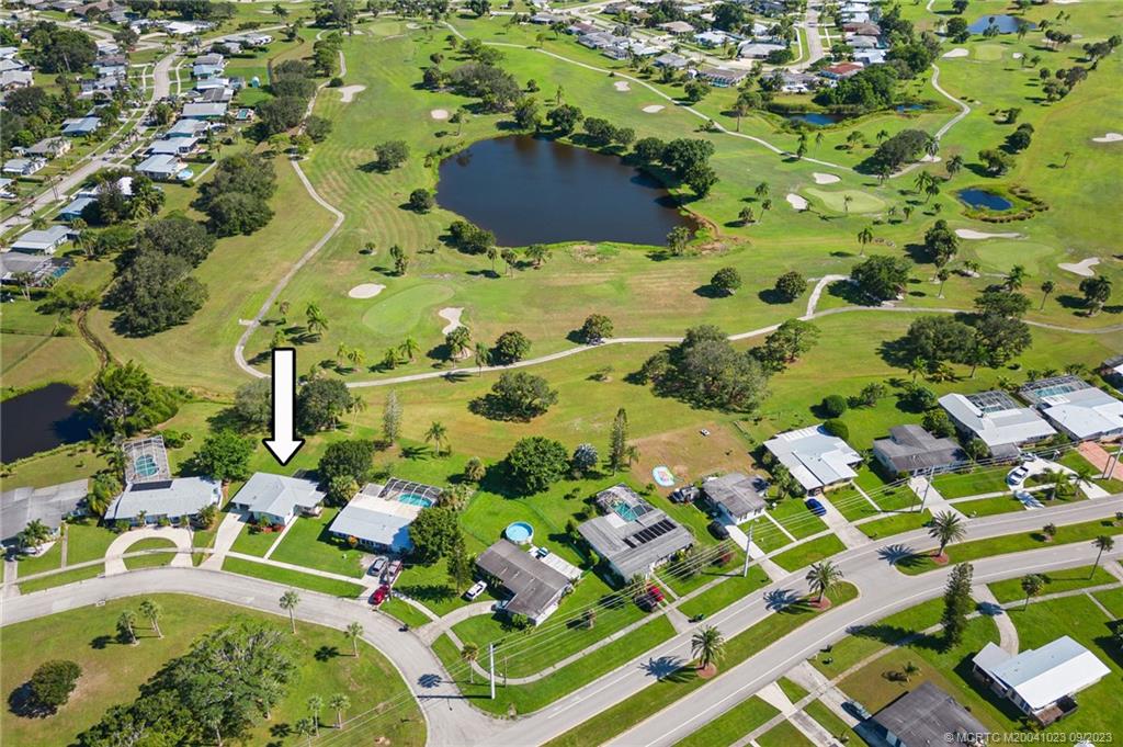 2825 Southeast Pocatella Road Port St. Lucie, FL 34952 - Photo 35 of 36 view of house with yard