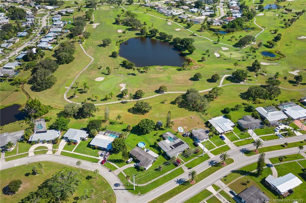 2825 Southeast Pocatella Road Port St. Lucie, FL 34952 - Photo 36 of 36 view of house with yard